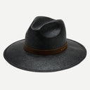 A black panama style hat with a leather hat band and a wide brim.